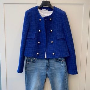 Lovely Mango short jacket to wear with jeans or dress pants.